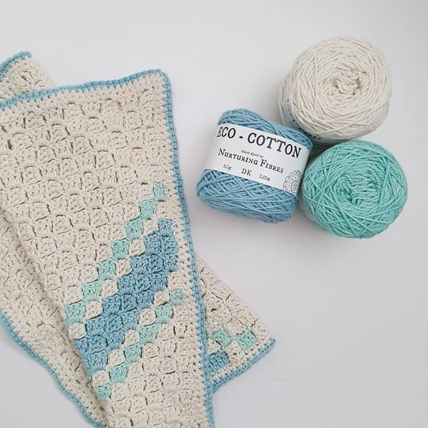 A vintage-look crochet dishclot.