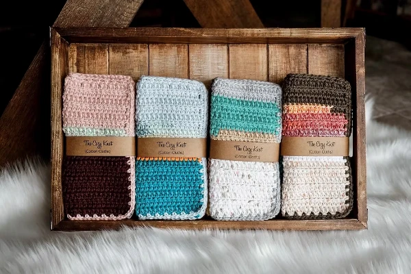 A collection of scrap yarn crochet dishcloths.