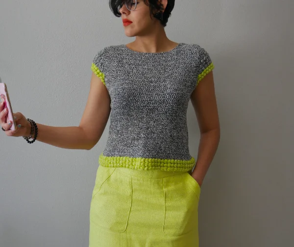 A crochet t-shirt with bobble stitch hem.