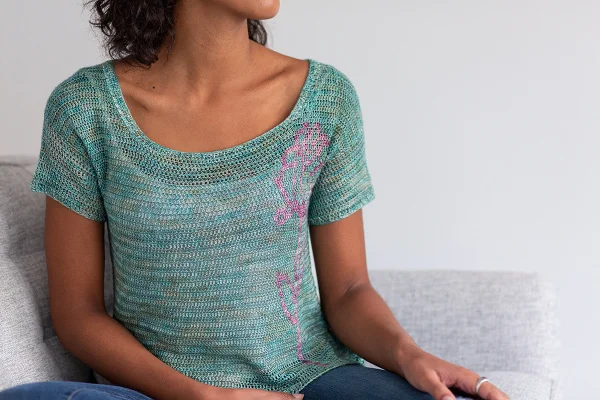 A crochet tee with a roundneck and colourwork details,