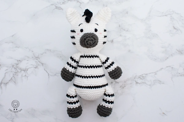 A cute black and white zebra toy.
