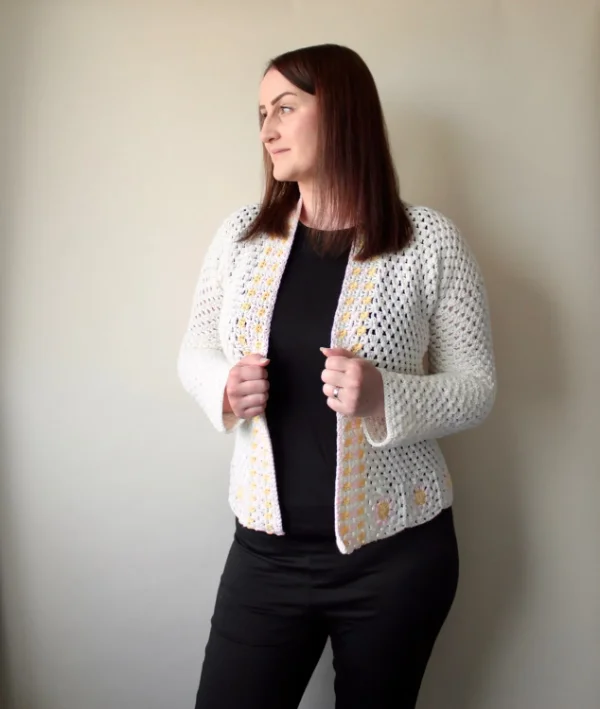 A granny stitch crochet cardigan with granny square edging.