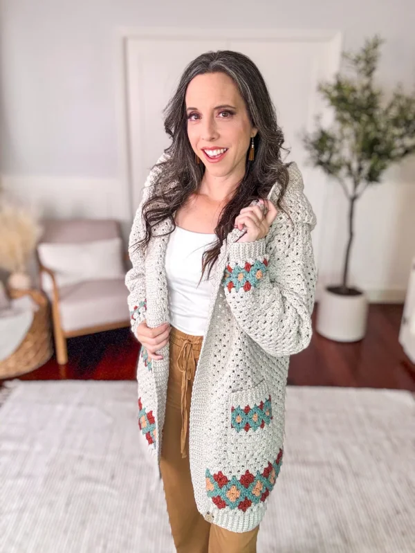 A granny stitch cardigan with granny diamond colourwork details.